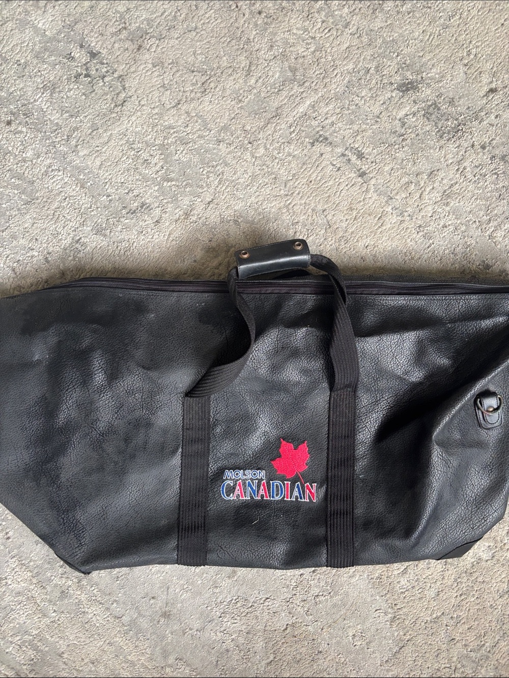 Black Duffel Bag with Red Maple Leaf Accent